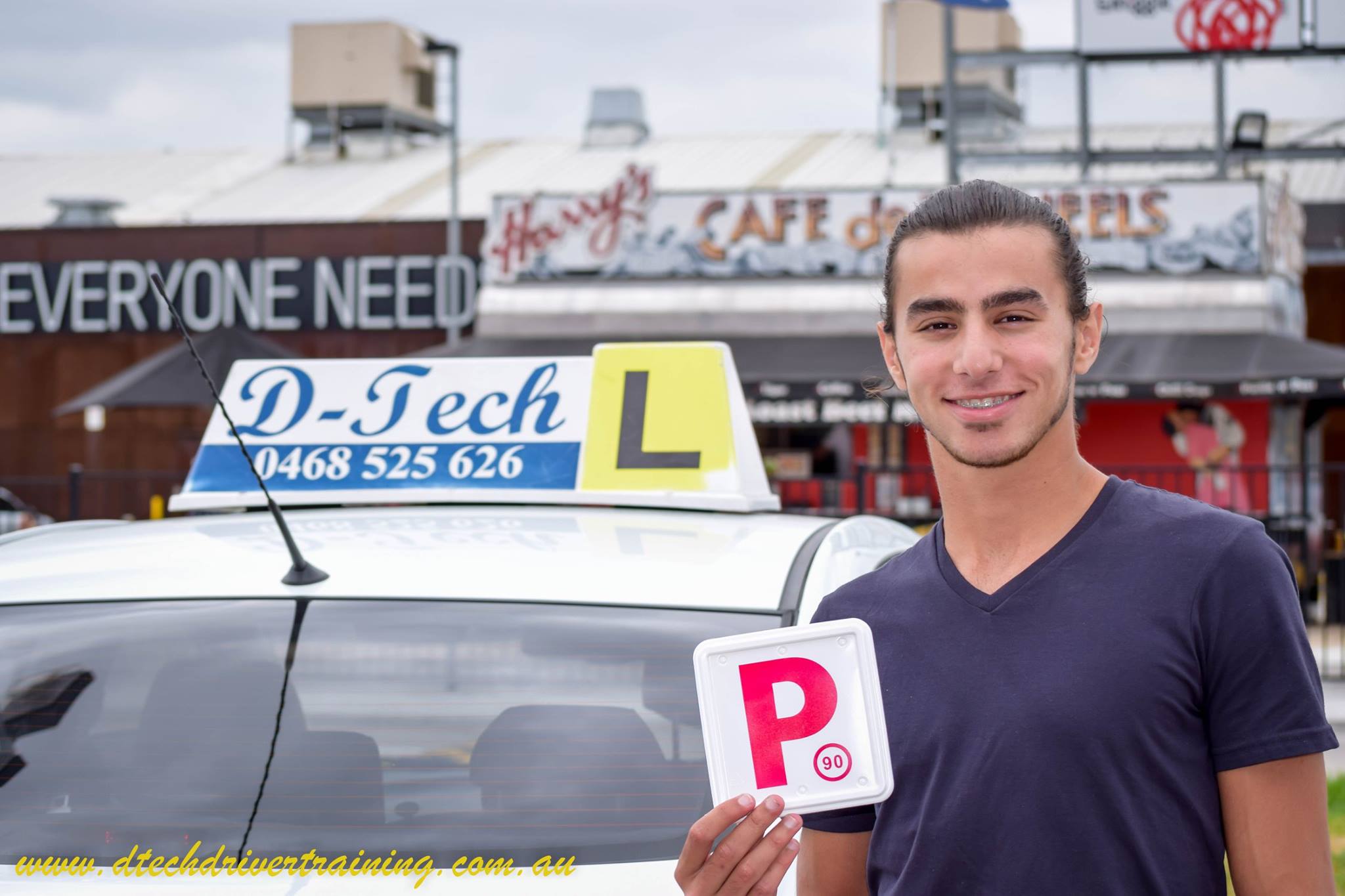 D-Tech Driver Training instructor delivering professional driving lessons for a beginner student in Toongabbie NSW 2146.