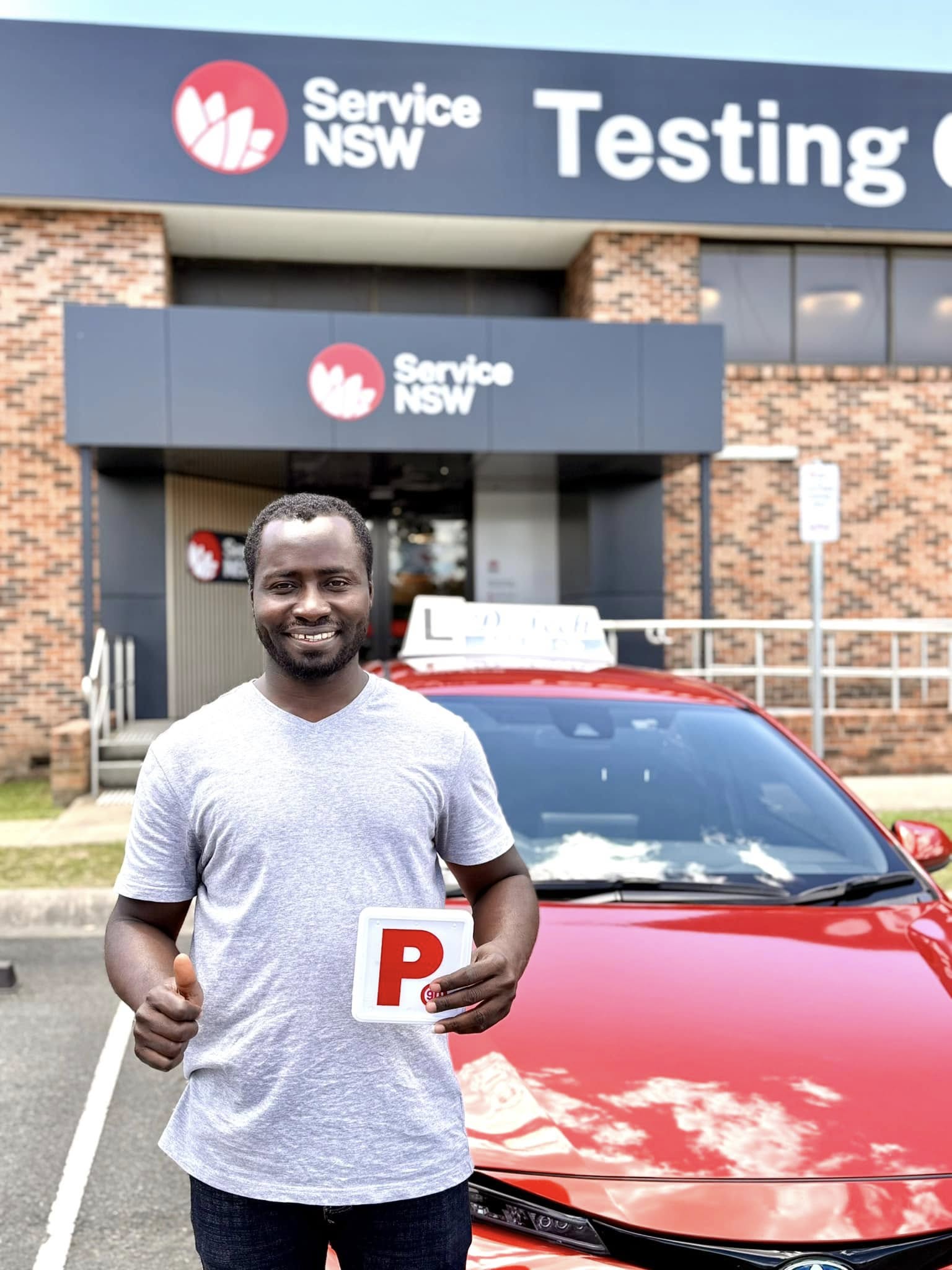 Happy learner driver passing their practical assessment first time with D-Tech at St Marys 3.